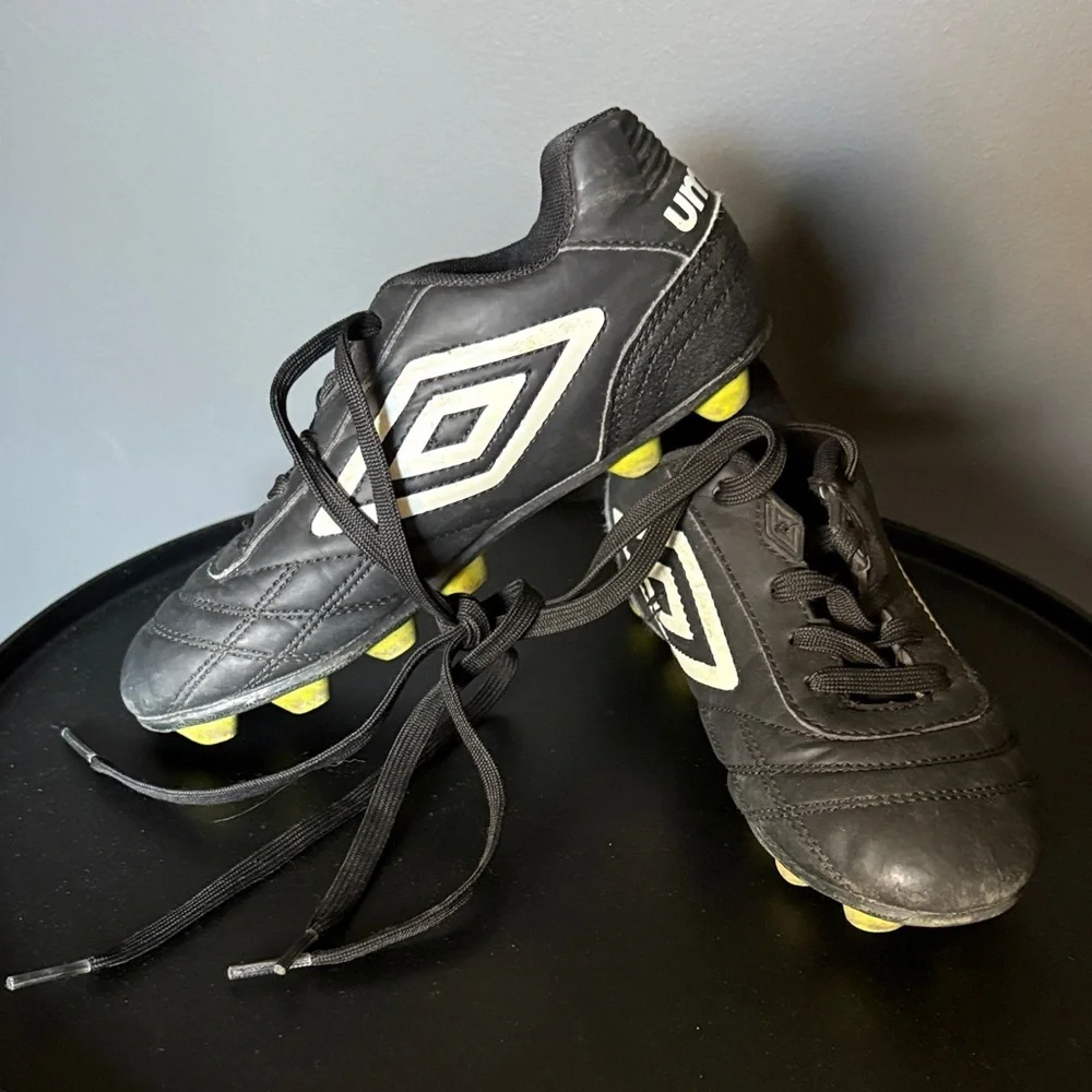 Umbro kids size 1 Black and White Cleats with Yellow Soles